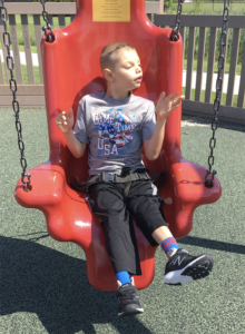 Special Needs Son on Swing